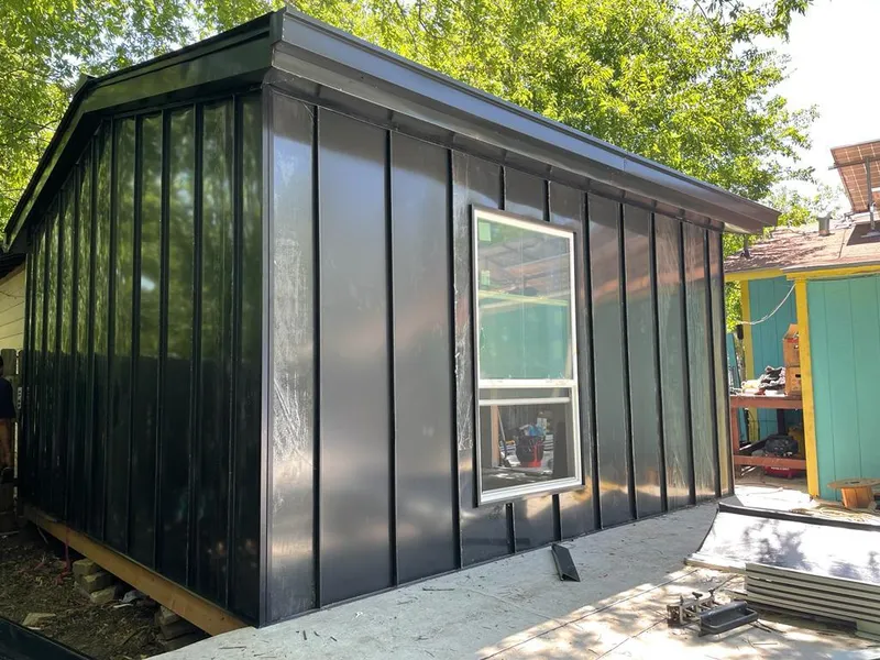 Black standing seam metal wall panels for Metal Roof Installation in Port Washington